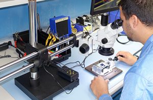 Technician calibrating Easy-Laser unit