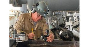 setting up laser equipment for flatness measurement