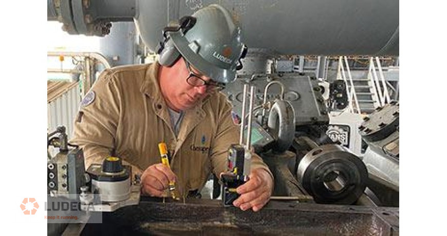 setting up laser equipment for flatness measurement